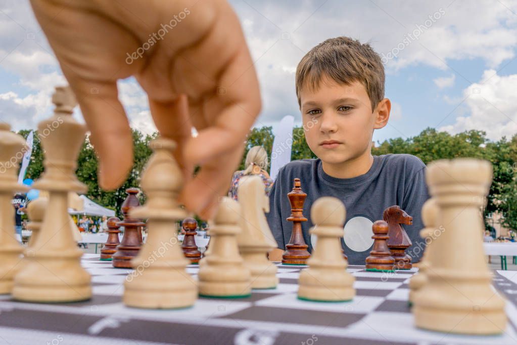 Club chess player analyzing games after a match
